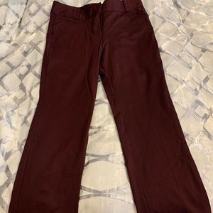 Alfano trouser leg pants w/ tummy control wine w/ faux leather trim in pockets.